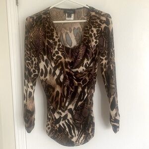 NUEVA, long sleeved fitted brown animal print top. Size 8